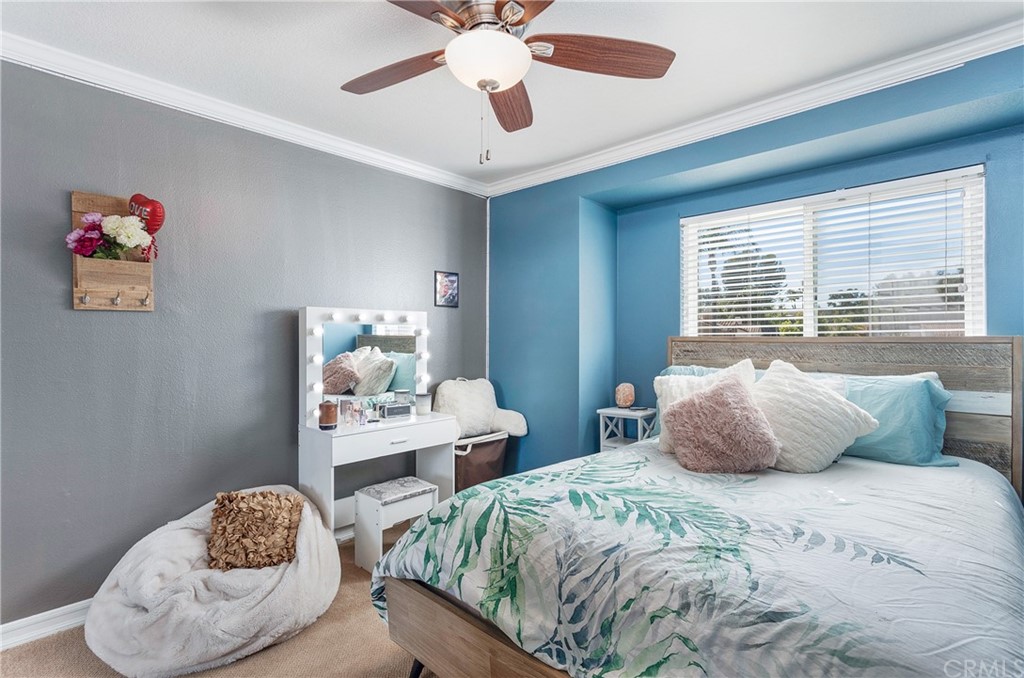 20 Stream Street Laguna Niguel, CA 92677 - Photo 12 of 28 a bedroom with a bed and a window