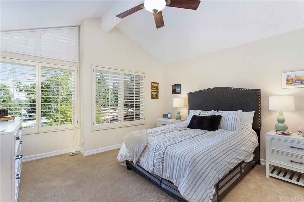 20 Stream Street Laguna Niguel, CA 92677 - Photo 16 of 28 a bedroom with a bed and a large window