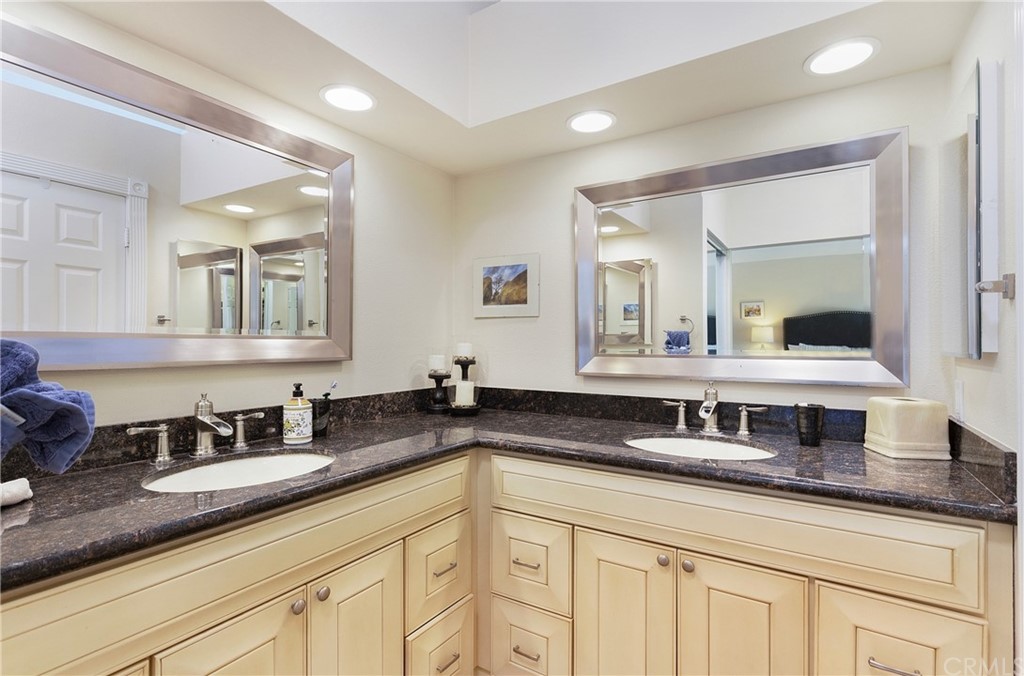 20 Stream Street Laguna Niguel, CA 92677 - Photo 18 of 28 a bathroom with double sink and a mirror