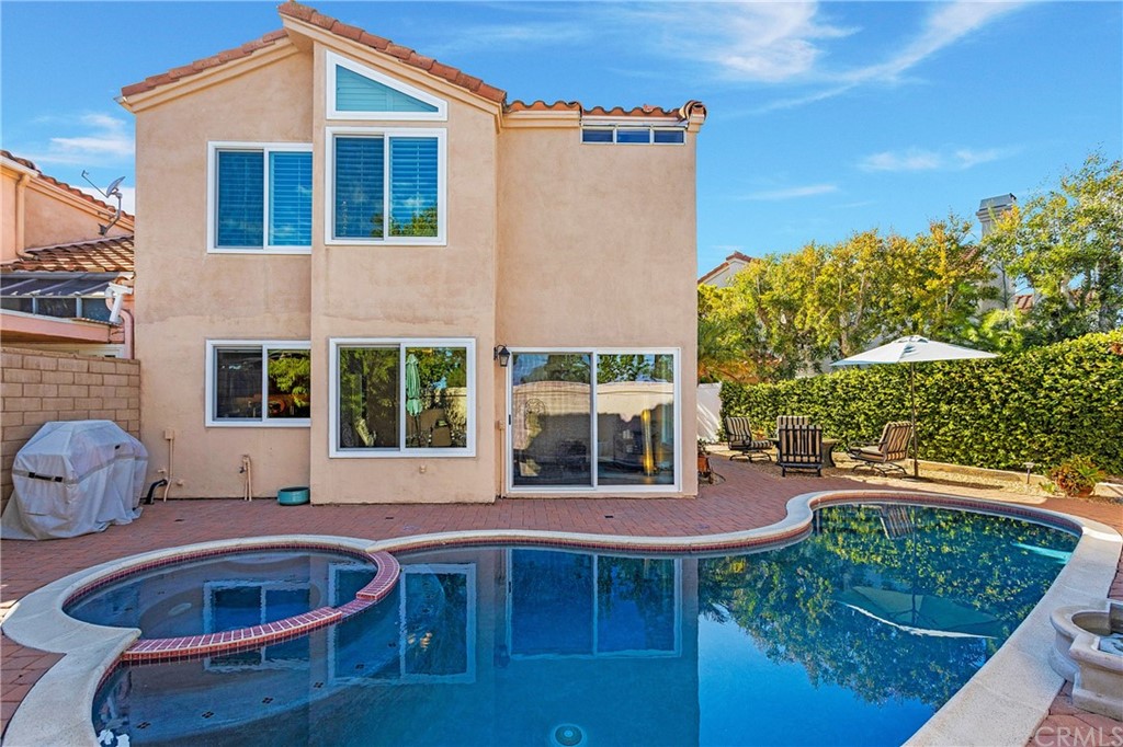 20 Stream Street Laguna Niguel, CA 92677 - Photo 22 of 28 a house view with a seating space and garden space