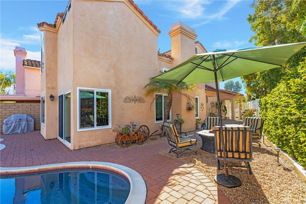 20 Stream Street Laguna Niguel, CA 92677 - Photo 23 of 28 a view of balcony with furniture and umbrella