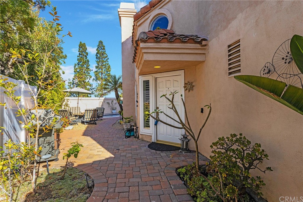 20 Stream Street Laguna Niguel, CA 92677 - Photo 25 of 28 a view of a entryway door of the house