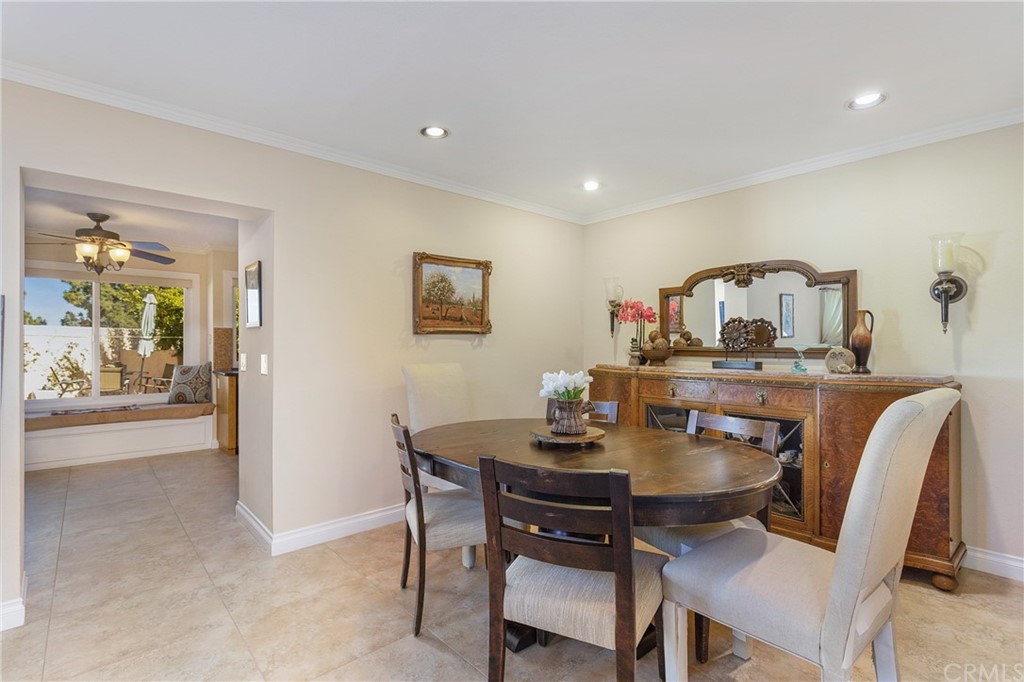 20 Stream Street Laguna Niguel, CA 92677 - Photo 8 of 28 a view of a dining room with furniture and a potted plant