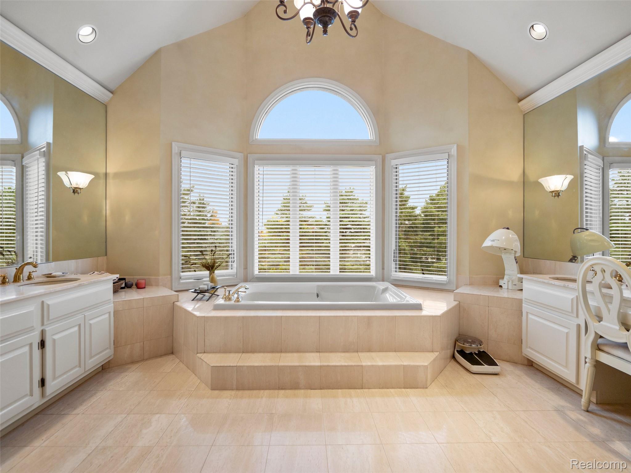 5724 Murfield Drive Rochester, MI 48306 - Photo 83 of 99 Full bathroom with vanity, recessed lighting, plenty of natural light, crown molding, and light tile patterned flooring