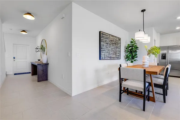 a bedroom with bed and wooden floor