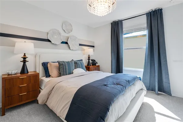 a bathroom with a double vanity sink toilet and shower