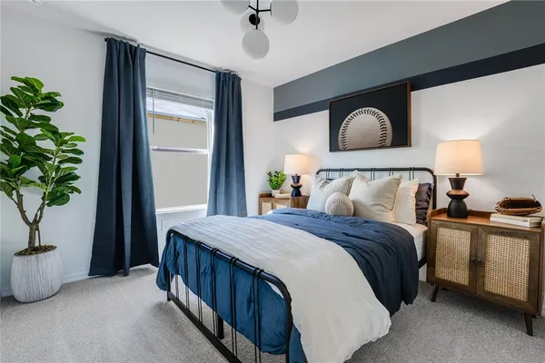 a view of a room with a table and chairs