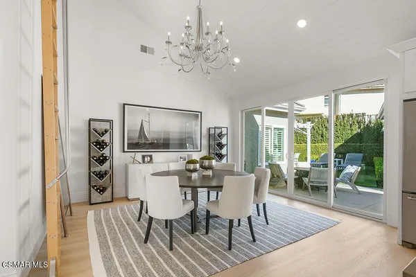 a bedroom with a bed and a view of bathroom