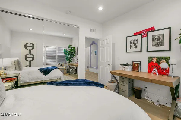 a workspace with furniture and a window