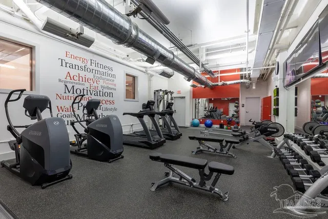 a view of a room with gym equipment