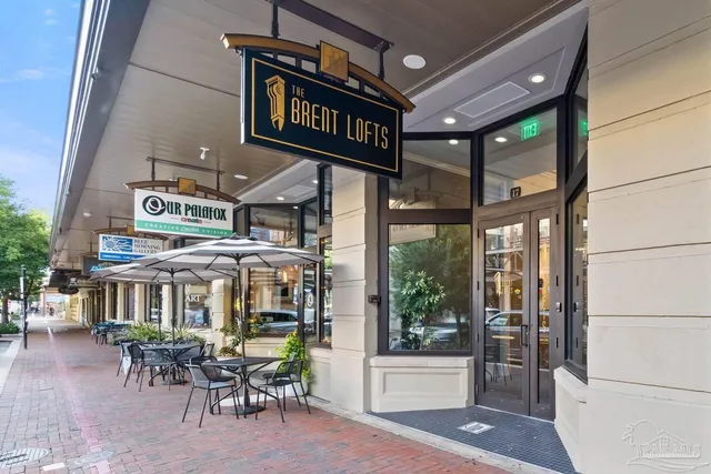 a view of a chairs and table in a patio