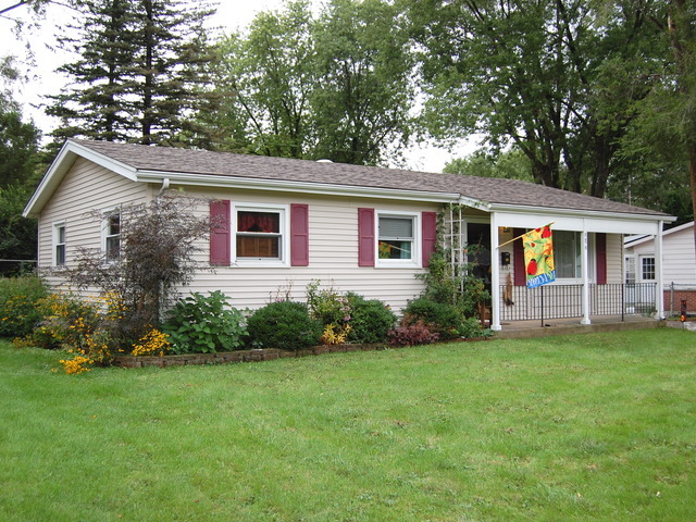 686 Walnut Road Wauconda, IL 60084 - Photo 1 of 21 a front view of house with yard and green space