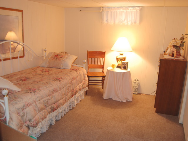 686 Walnut Road Wauconda, IL 60084 - Photo 14 of 21 a bedroom with bed and window