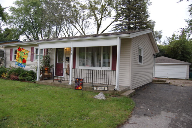 686 Walnut Road Wauconda, IL 60084 - Photo 2 of 21 a front view of a house with a garden