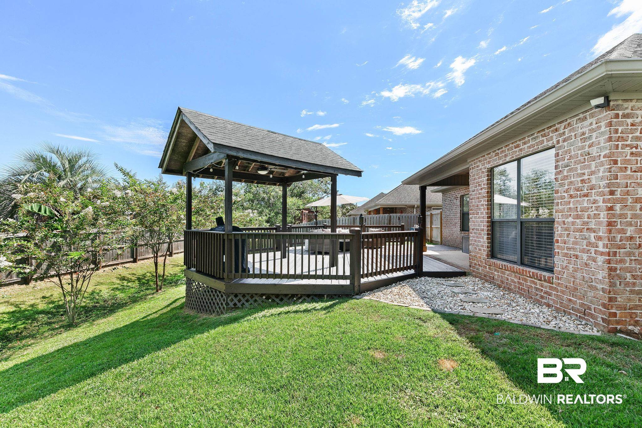 9522 Sanibel Loop Daphne, AL 36526 - Photo 35 of 43 View of yard with a wooden deck and a patio