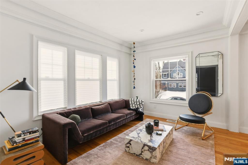 403 Lawn Ridge Road Orange, NJ 07050 - Photo 13 of 45 a living room with furniture a rug and a window