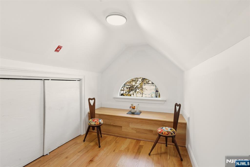 403 Lawn Ridge Road Orange, NJ 07050 - Photo 40 of 45 a view of a workspace with furniture and wooden floor