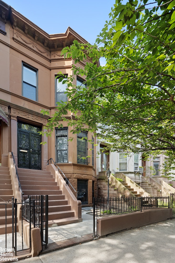 1456 Dean Street Brooklyn, NY 11213 - Photo 15 of 28 a front view of a building with garden