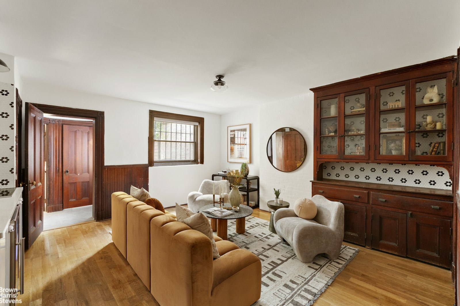1456 Dean Street Brooklyn, NY 11213 - Photo 24 of 28 a living room with furniture a lamp and a large window