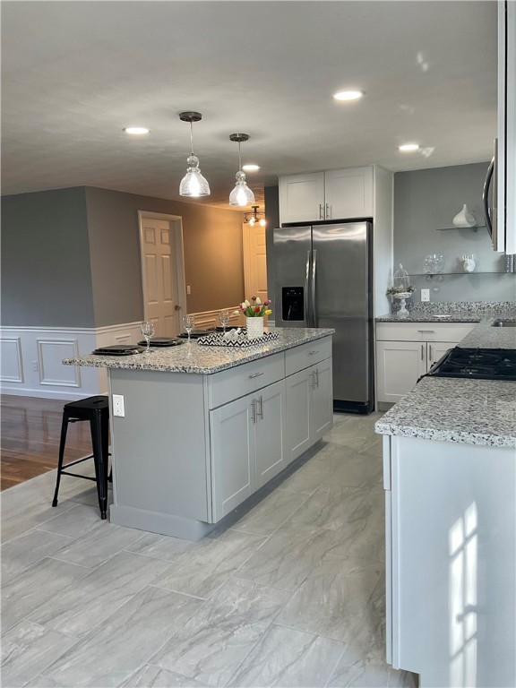21 Continental Road Smithfield, RI 02828 - Photo 15 of 25 Island with gray cabinets