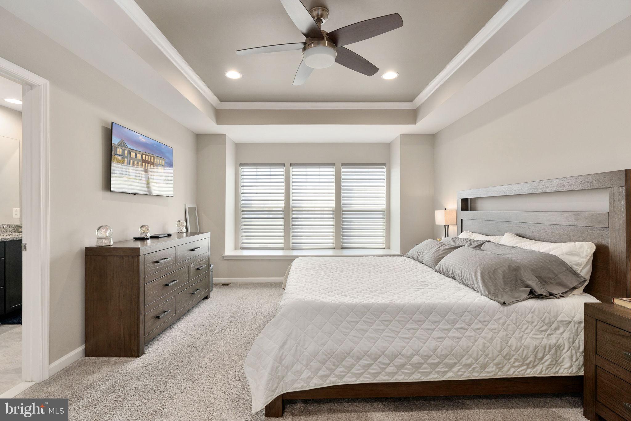 650 Aspen Road, Unit 108 Stafford, VA 22554 - Photo 21 of 30 a bedroom with a large bed and a window