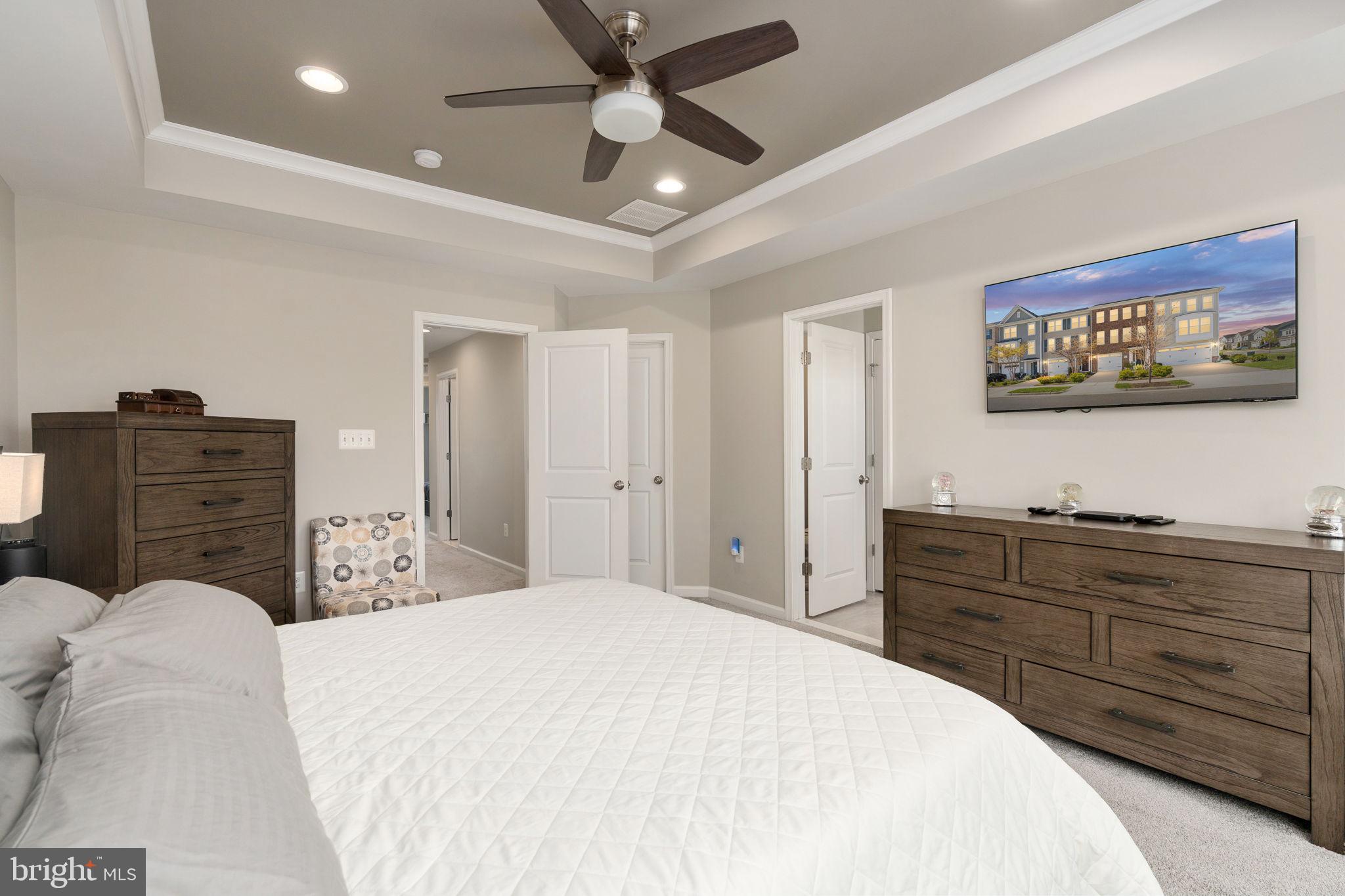 650 Aspen Road, Unit 108 Stafford, VA 22554 - Photo 22 of 30 a bedroom with a bed and a dresser