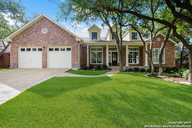 18214 Crystal Ridge Drive San Antonio, TX 78259 - Photo 1 of 1 front view of a house with a yard