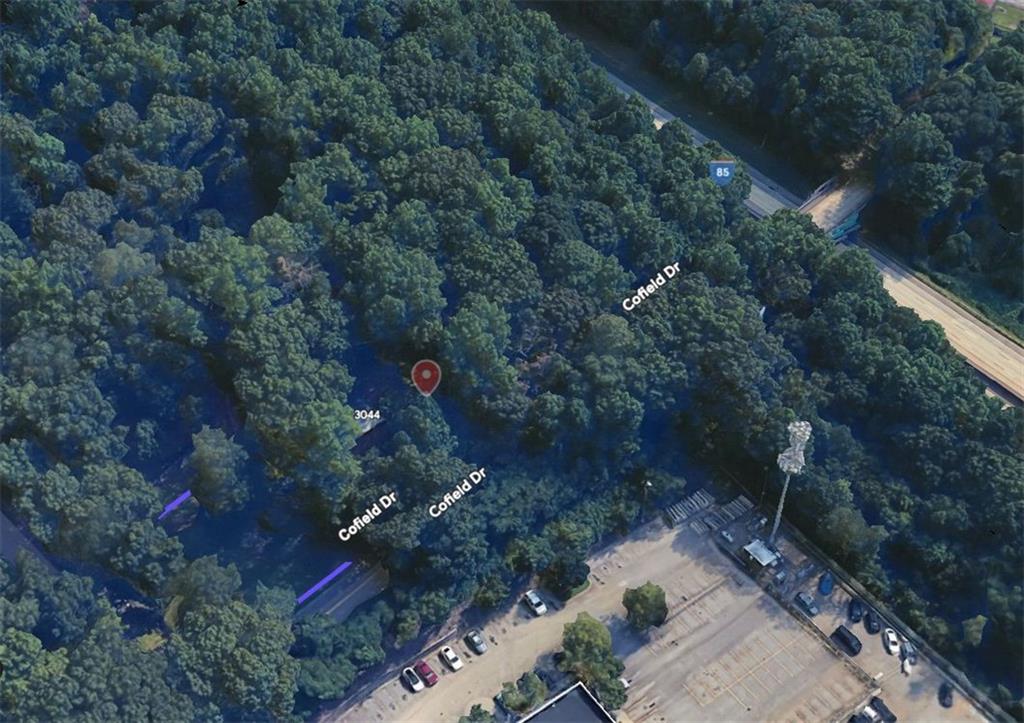 3044 Springdale Road Hapeville, GA 30354 - Photo 1 of 10 a view of street with green space