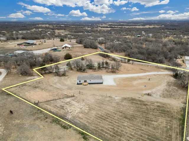 a view of beach and yard