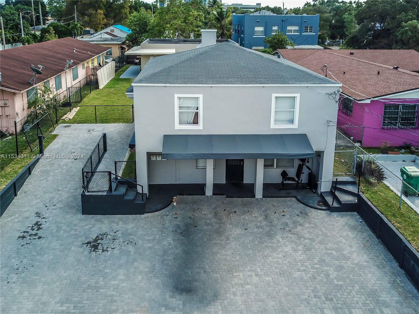 1810 Northwest 34th Street Miami, FL 33142 - Photo 3 of 33 an aerial view of a house