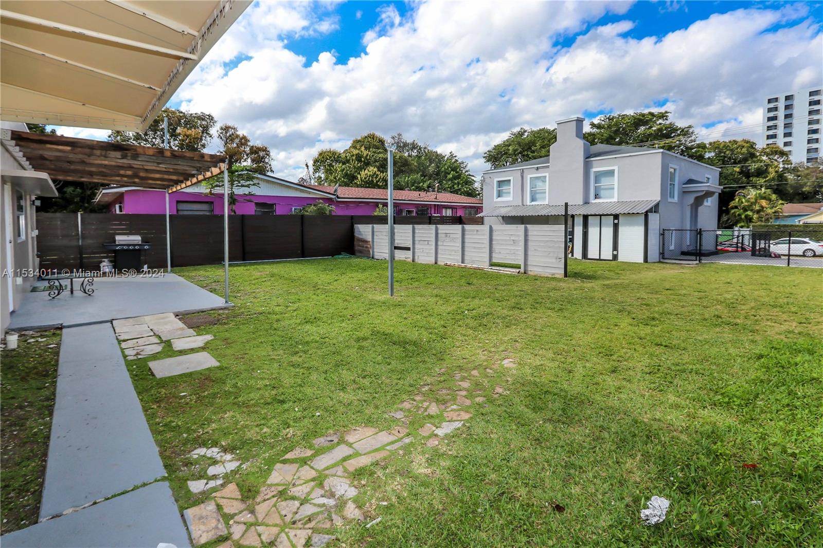 1810 Northwest 34th Street Miami, FL 33142 - Photo 31 of 33 a view of a backyard