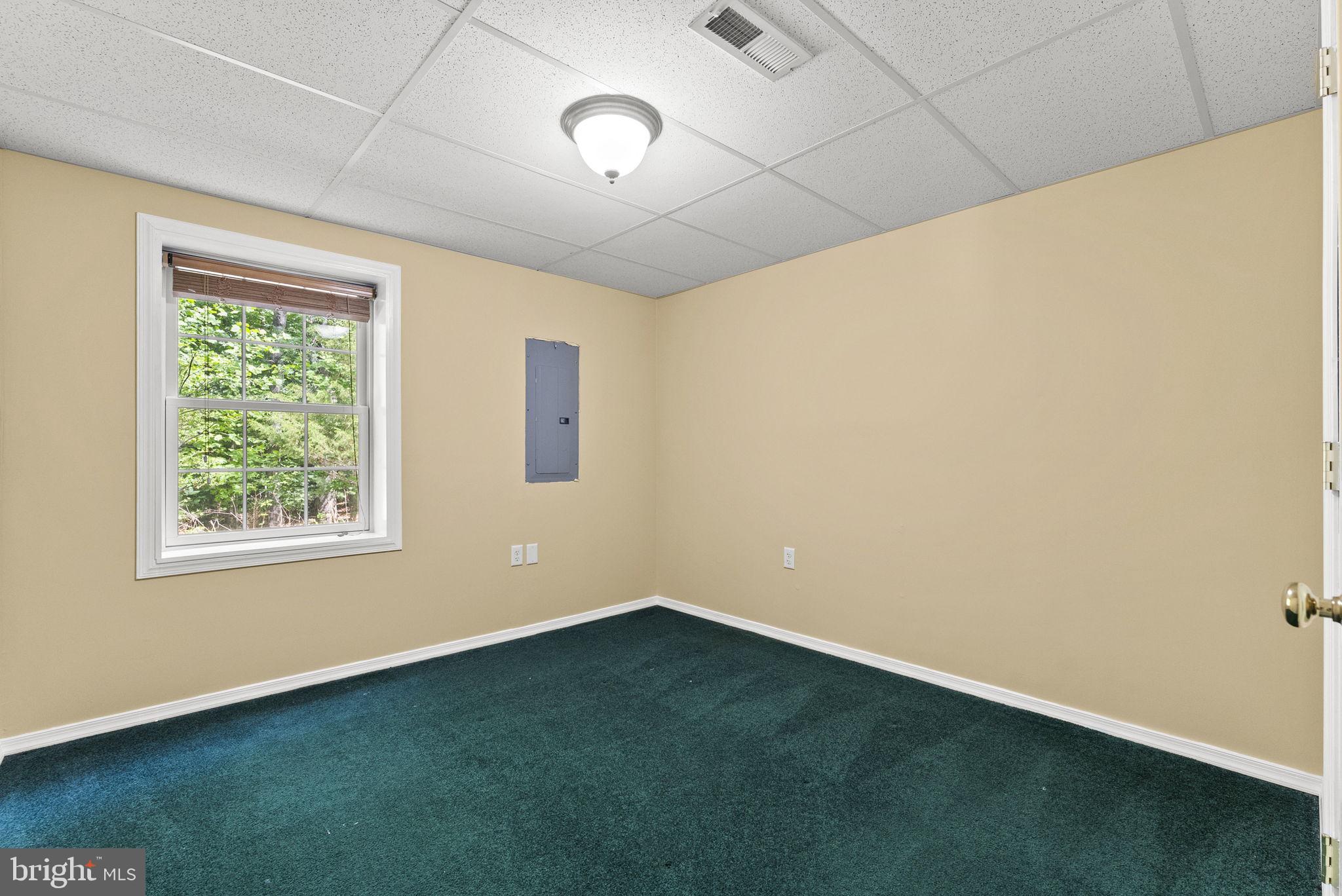 20065 Crooked Run Road Culpeper, VA 22701 - Photo 38 of 62 a view of an empty room with a window