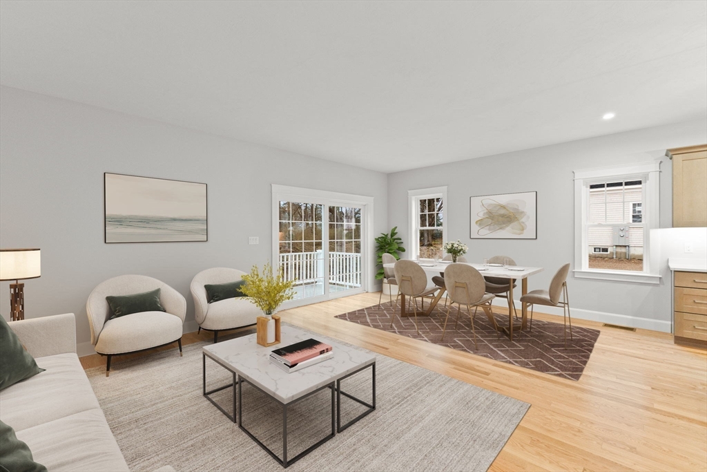 35 Leonard Street, Unit 3 Bridgewater, MA 02324 - Photo 12 of 29 a living room with furniture and wooden floor