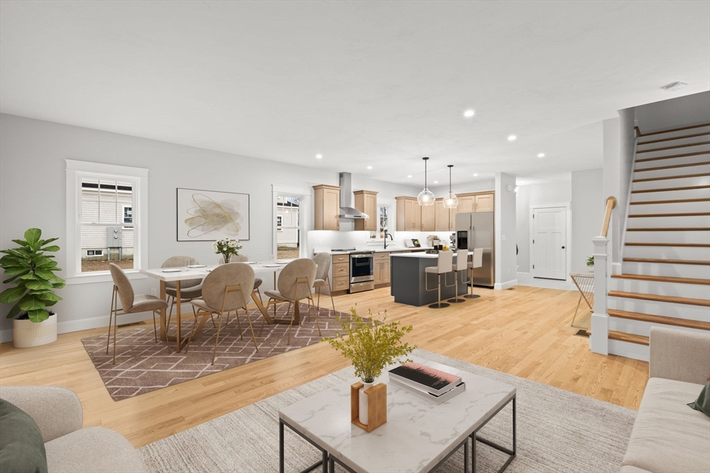 35 Leonard Street, Unit 3 Bridgewater, MA 02324 - Photo 18 of 29 a living room with lots of furniture and kitchen view