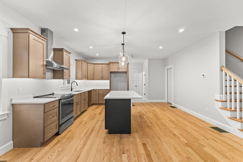 35 Leonard Street, Unit 3 Bridgewater, MA 02324 - Photo 7 of 29 a kitchen with a sink and cabinets