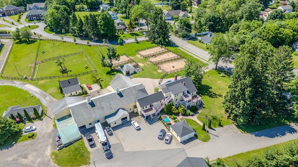 120 Goldsmith Street, Unit 4 Littleton, MA 01460 - Photo 2 of 26 an aerial view of a house with a swimming pool