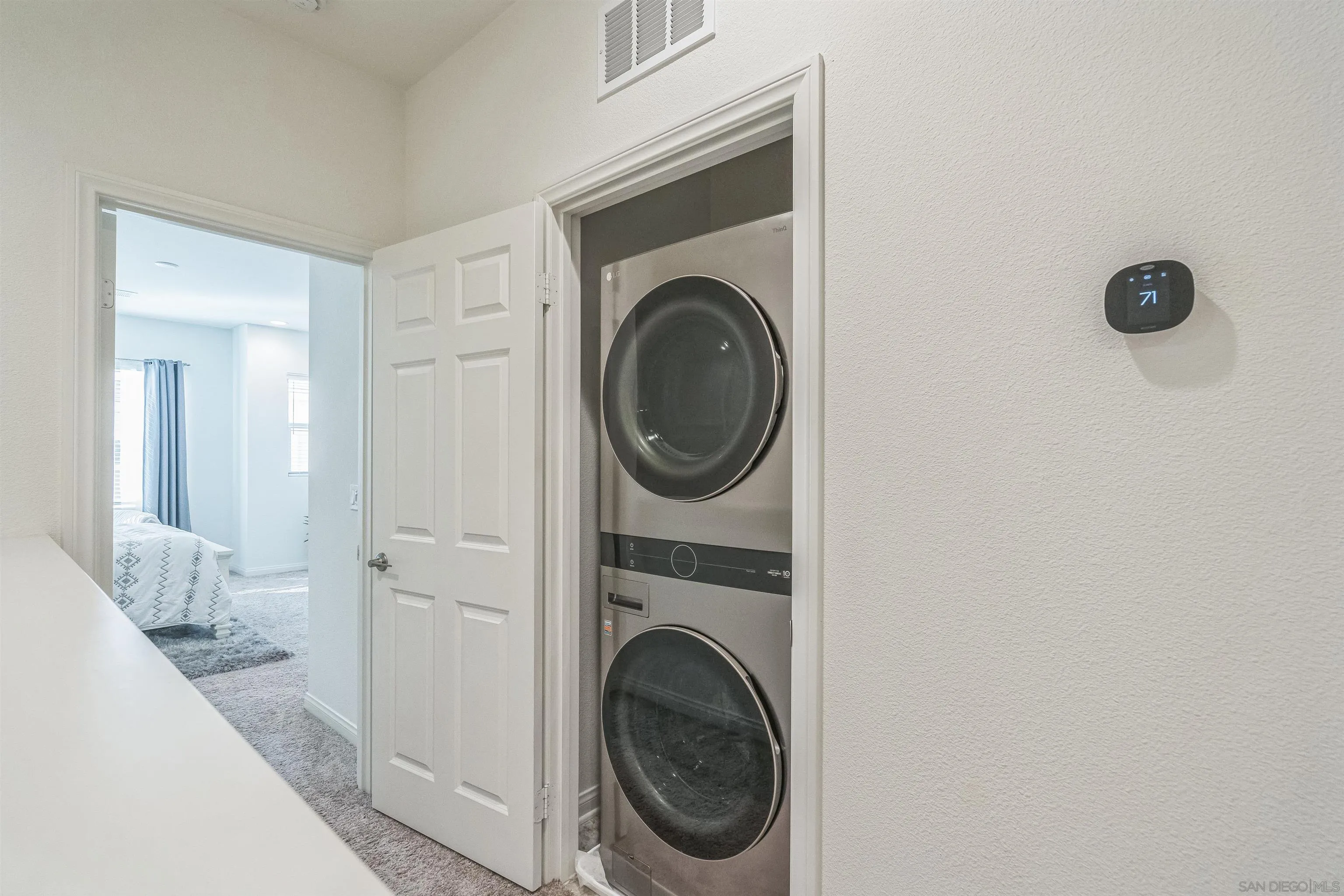 2018 Barite Street Spring Valley, CA 91977 - Photo 24 of 47 a utility room with dryer and washer