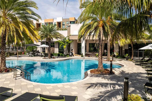 a view of outdoor space with swimming pool and patio