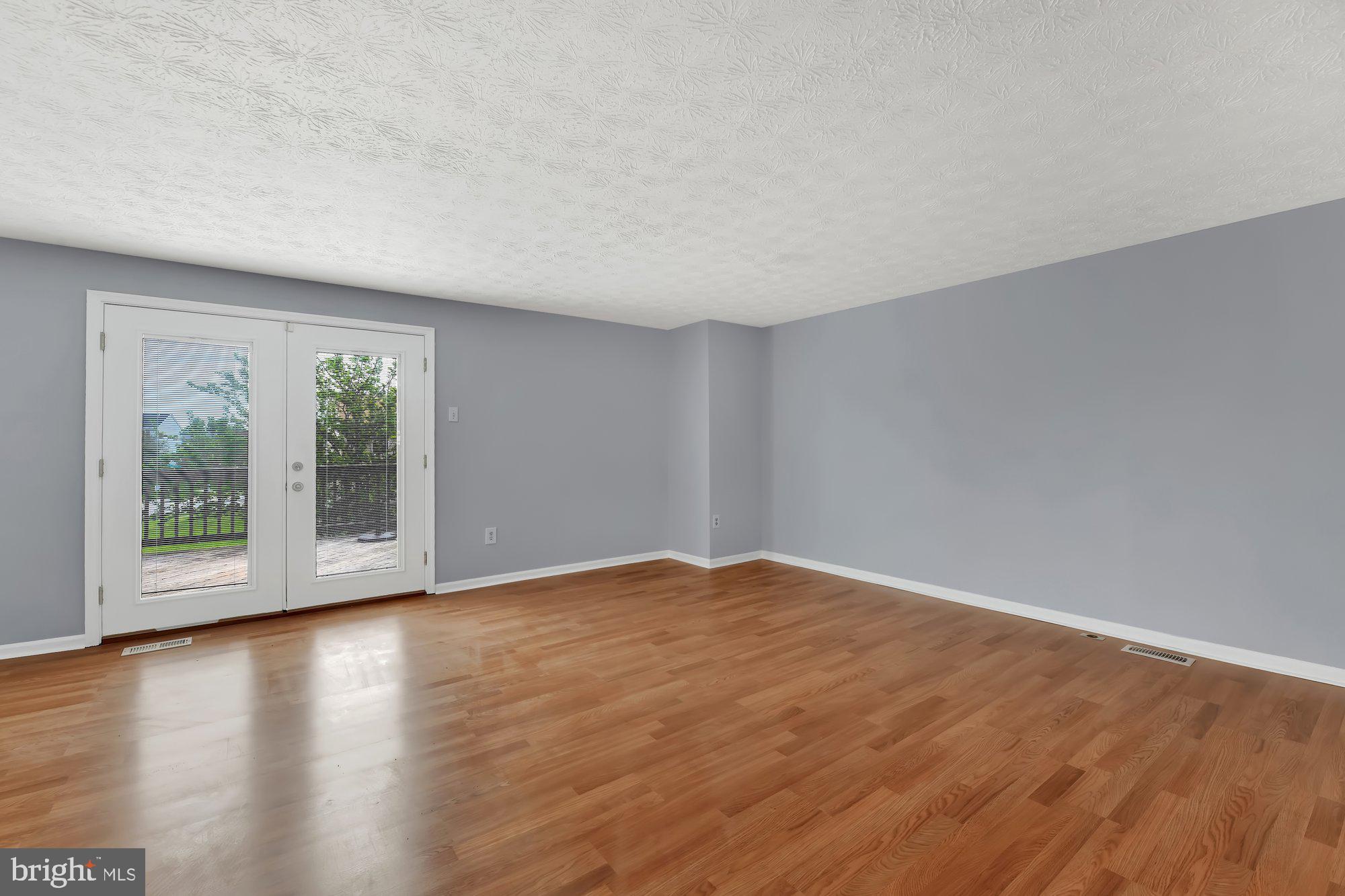 15 Rader Court Baltimore, MD 21234 - Photo 4 of 15 Main level living room with new flooring!