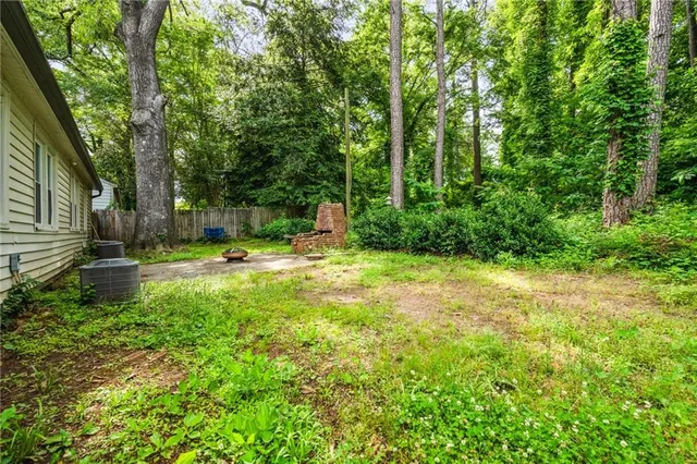 a house view with a backyard space