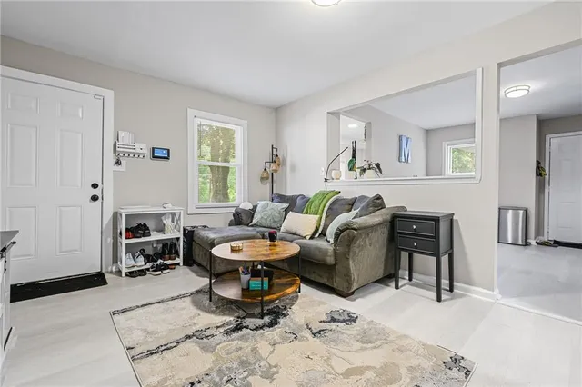 a utility room with cabinets washer and dryer