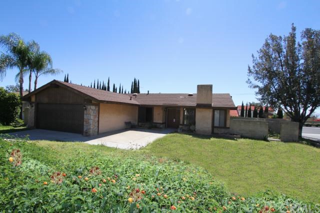 8601 Hawthorne Street Rancho Cucamonga, CA 91701 - Photo 1 of 1 a view of a house with a yard and large tree