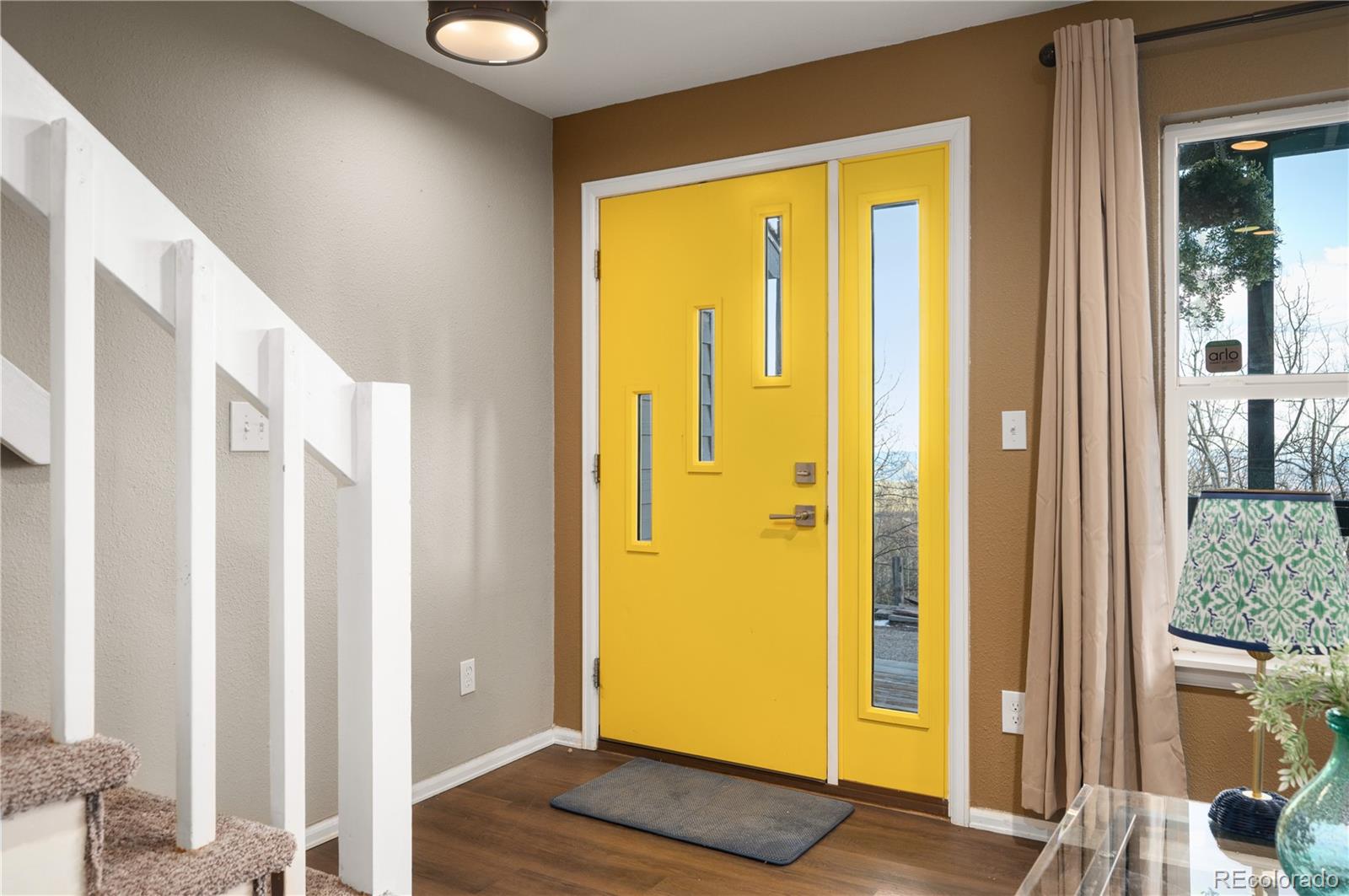 11740 Baca Road Conifer, CO 80433 - Photo 9 of 49 a view of a bathroom with a door