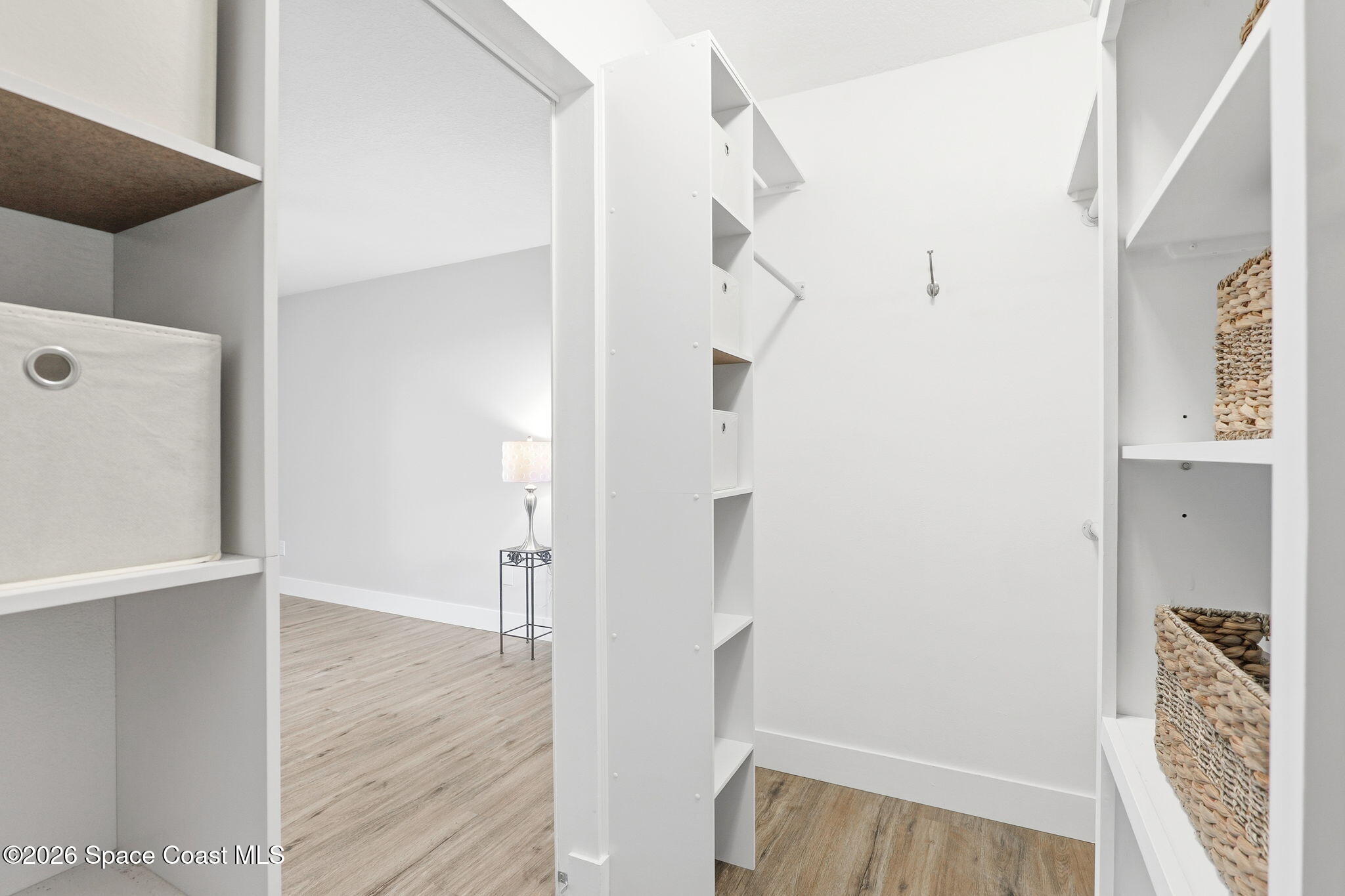 984 Bayberry Lane Rockledge, FL 32955 - Photo 24 of 39 a view of hallway with wooden floor