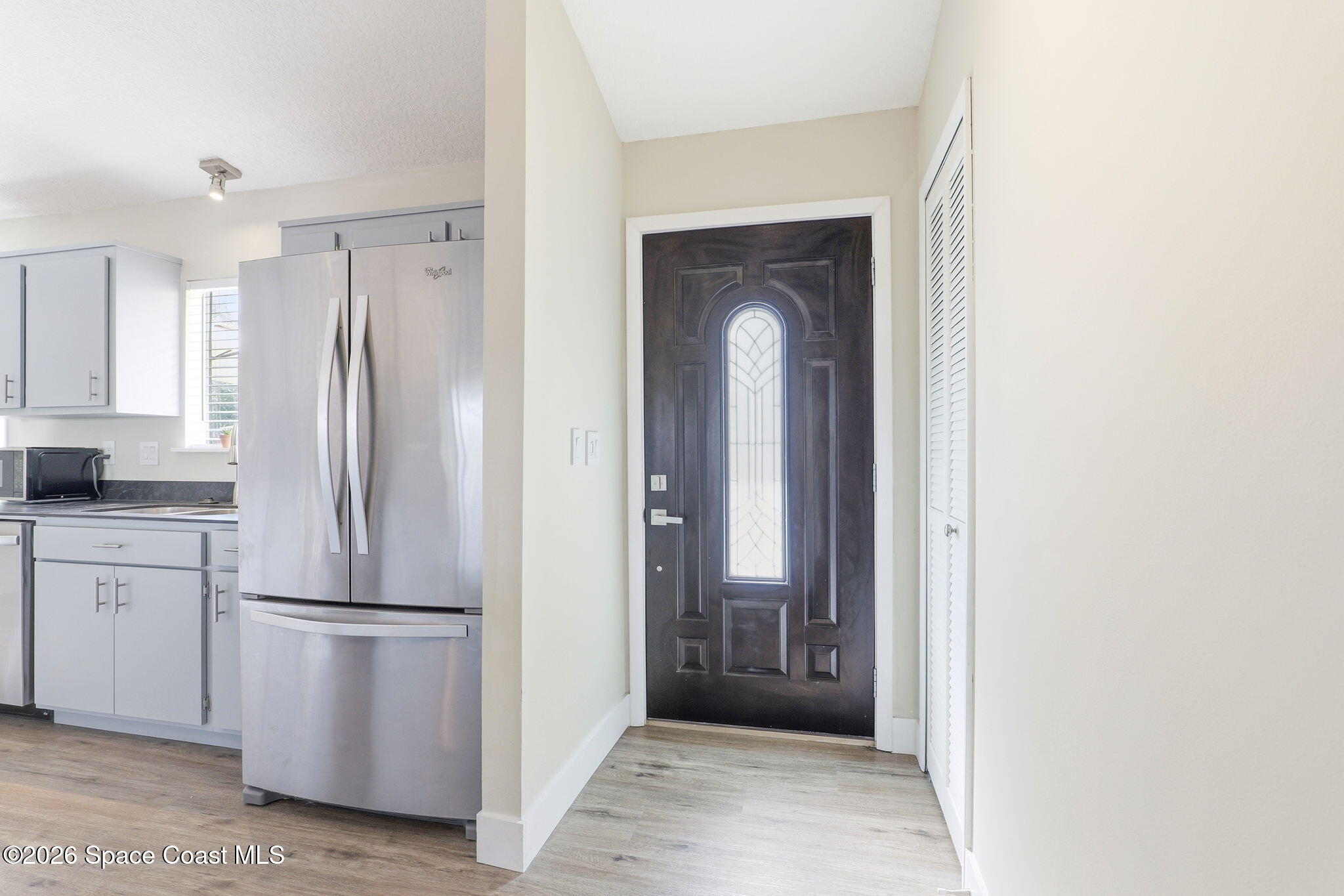 984 Bayberry Lane Rockledge, FL 32955 - Photo 6 of 39 a view of a kitchen with a refrigerator