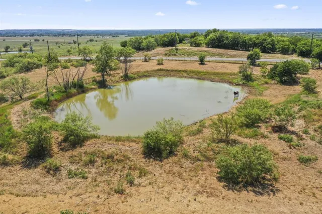 swimming pool view with a outdoor seating space