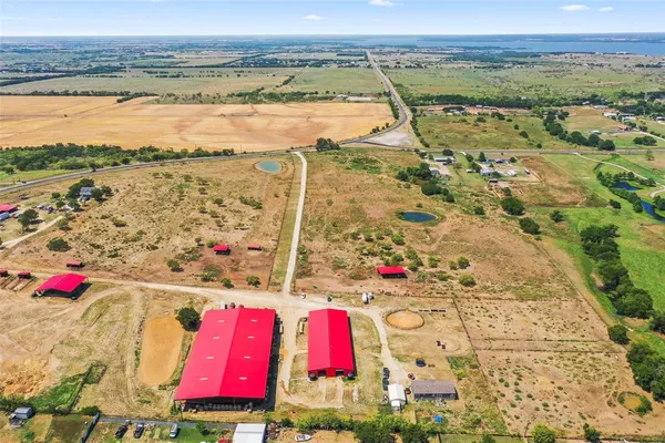 a view of swimming pool with a table and chairs