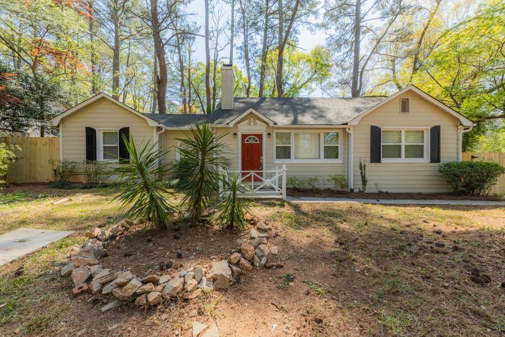 front view of a house with a yard