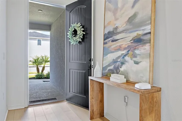 a view of entryway with wooden floor