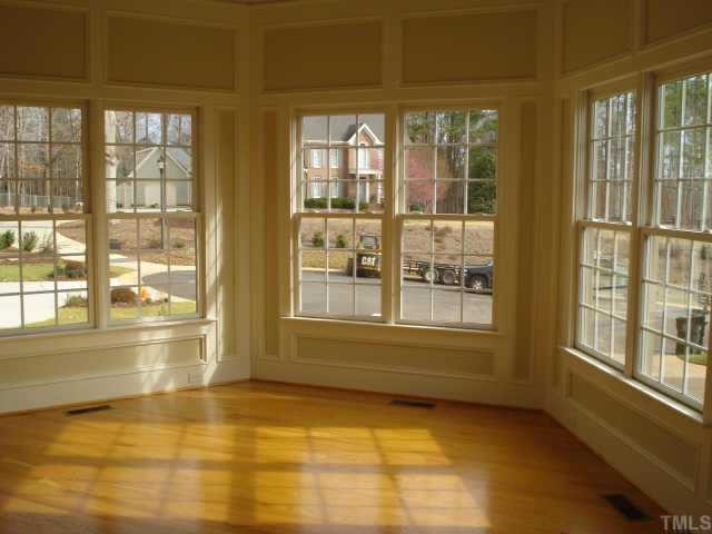 7611 Devere Court Raleigh, NC 27613 - Photo 5 of 12 INCREDIBLE OCTAGONAL LIVING ROOM WITH OUTSTANDING TRIM AND WONDERFUL LIGHT
